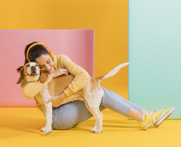 happy woman with cute dog 23 2148510263 - Join Our '2 Weeks 2 Speak' Temporary Foster Program